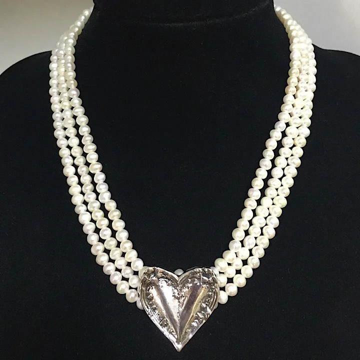 layered gold necklaces for women -3 STRAND PEARL NECKLACE WITH SILVER HEART CENTREPIECE